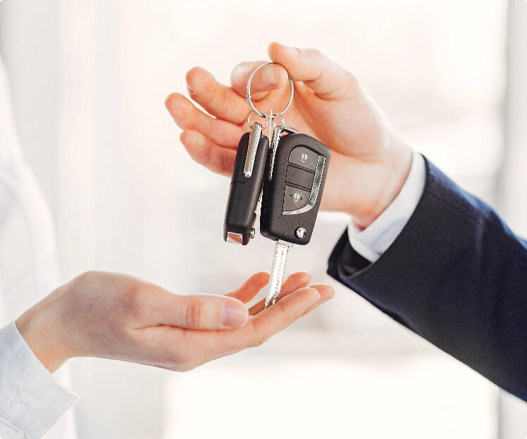 Passing a car key to valet.